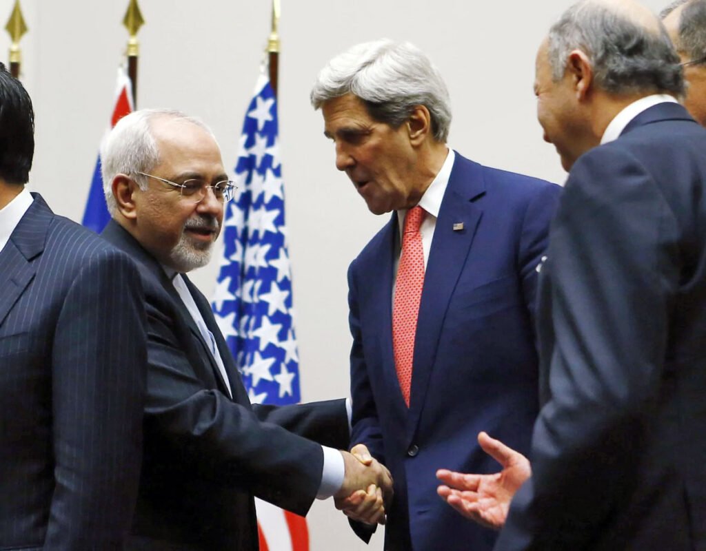 01 zarif kerry handshake theiranproject.com